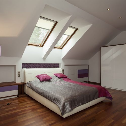 bright bedroom with wooden floor and violet additions