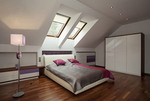 bright bedroom with wooden floor and violet additions